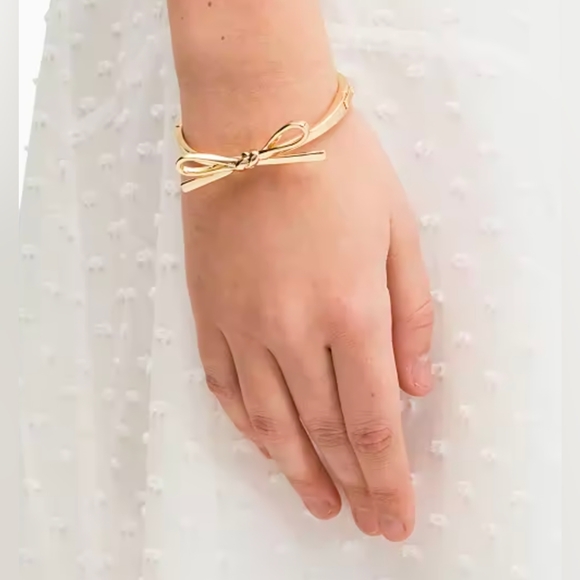 NWT KATE SPADE Skinny Mini Bow Bangle Bracelet Gold - Picture 3 of 6